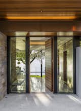 Exterior, Stucco, Glass, House, Metal, Wood, Flat, and Stone  Exterior Wood House Glass Metal Stone Photos from Shoreline Residence
