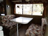 The Winnebago's original dinette area before they renovated it.