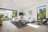 Living Room with Large Picture Window and Pocket Fleetwood Sliding Doors
