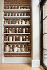 Kitchen, Engineered Quartz Counter, Brick Backsplashe, and Marble Counter Ingredients on display  Photos from Historic Kitchen Remodel