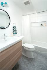 Bath Room, Engineered Quartz Counter, Porcelain Tile Floor, Alcove Tub, Wall Lighting, and Ceramic Tile Wall  Photo 1 of 34 in Modern Farmhouse by Kimball Modern