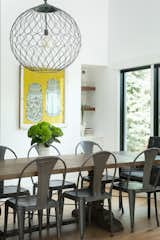 Dining Room, Bar, Light Hardwood Floor, Pendant Lighting, Table, Shelves, Storage, and Chair  Photo 4 of 34 in Modern Farmhouse by Kimball Modern