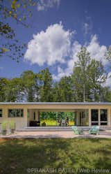 Outdoor, Trees, Small Patio, Porch, Deck, Grass, Back Yard, and Concrete Patio, Porch, Deck View of dogtrot.  Photo 15 of 16 in Dogtrot at Stony Point by hays+ewing design studio