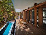 Outdoor, Lap Pools, Tubs, Shower, Concrete Fences, Wall, Wood Patio, Porch, Deck, and Front Yard  Photo 6 of 16 in Stony Point House by hays+ewing design studio