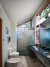 Bath Room, Granite Counter, Ceramic Tile Floor, Drop In Sink, Enclosed Shower, Recessed Lighting, and Two Piece Toilet  Photo 14 of 16 in Stony Point House by hays+ewing design studio