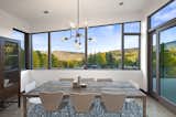 Dining Room, Chair, Table, Pendant Lighting, and Medium Hardwood Floor  Photo 6 of 7 in The Klug Residence by KA DesignWorks