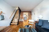 Living Room, Medium Hardwood Floor, Table Lighting, Chair, Coffee Tables, and Sofa  Photo 8 of 9 in O Street Townhouse by Two Street Studio