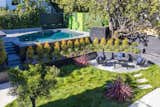Outdoor, Back Yard, Trees, Large Pools, Tubs, Shower, Grass, Shrubs, Gardens, Raised Planters, Large Patio, Porch, Deck, and Walkways  Photo 14 of 16 in Italian Modernist Home by Zillow