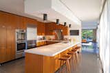 Kitchen, Wood Cabinet, Ceiling Lighting, Wall Oven, Refrigerator, and Drop In Sink  Photo 16 of 16 in Best Kitchens by Dwell from Briarcliff Manor