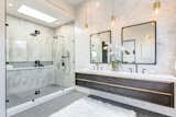 Bath Room, Quartzite Counter, Enclosed Shower, Corner Shower, Ceiling Lighting, and Pendant Lighting  Photo 11 of 17 in 2701 Armacost by Zillow