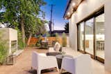 Back Yard, Large Patio, Porch, Deck, Horizontal Fences, Wall, Trees, and Exterior  Photo 16 of 17 in 2701 Armacost by Zillow