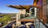 Outdoor, Rooftop, Desert, Front Yard, Side Yard, Boulders, Small Pools, Tubs, Shower, Small Patio, Porch, Deck, Wire Fences, Wall, Metal Fences, Wall, and Metal Patio, Porch, Deck  Kevin B Howard Architects’s Saves from Canyon Pass Home at Dove Mountain