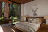 Guest room with bespoke Hawaiian Koa wood bed