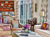 Living Room, Lamps, Sofa, Chair, Ottomans, Wall Lighting, and Table Lighting  Photo 10 of 36 in A Penthouse for the Young and Adventurous by Kati Curtis Design