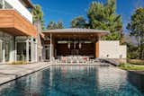 Outdoor, Hanging Lighting, Large Patio, Porch, Deck, Back Yard, Trees, Swimming Pools, Tubs, Shower, and Grass  Photo 2 of 12 in Bentleyville Residence by Dimit Architects