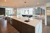 Kitchen, Ceiling Lighting, Pendant Lighting, and Light Hardwood Floor  Photo 11 of 12 in Bentleyville Residence by Dimit Architects