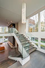 Staircase, Glass Railing, and Wood Tread  Photo 12 of 12 in Bentleyville Residence by Dimit Architects