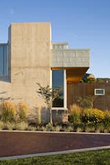 Exterior, Concrete Siding Material, Flat RoofLine, Metal Siding Material, and House Building Type Clark & Chapin Architects, Buffaloe House, Living Room Fireplace Exterior  Photo 2 of 8 in Buffaloe House by Matthew Clark