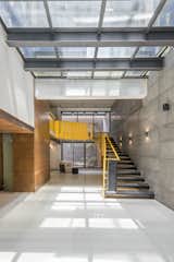 Sculpturesque yellow staircase at the basement