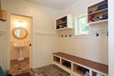 Mudroom off Gallery with Built ins for Storage and Half Bath Powder Room
