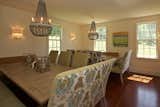 Dining Room, Bench, Table, Chair, Ceiling Lighting, and Medium Hardwood Floor Dining Room Perfect for Entertaining Any Holiday  Photo 10 of 16 in Dennis Wedlick Design Spencertown Home by Tracy Tassinari