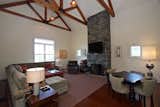 Great Room with Beams Stone Fireplace Game Table and Reading Loft