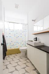 Bathrooms include cement tile by Cle, and salvaged tubs from a local building material re-sale store. 
