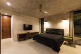 Bedroom, Bed, Storage, Night Stands, Shelves, Ceiling Lighting, Pendant Lighting, and Concrete Floor  Photo 11 of 11 in Casa Canto Cholul by Taller Estilo Arquitectura