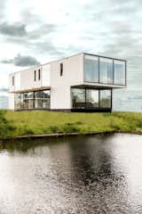 Exterior, Prefab Building Type, House Building Type, and Flat RoofLine Rear facade  Photos from Spacial Villa Heerenveen