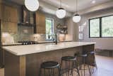 Kitchens with dine-in island and breakfast area. 