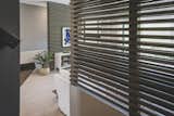 Mid-mod open slat wood wall