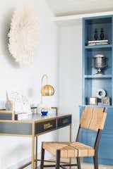 The home is furnished with an eclectic blend of coastal and industrial pieces. 