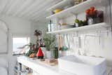 Kitchen and Vessel Sink @aubry.guillaume  Photo 4 of 11 in Viking Seaside Summer Cabin by zi ouiggy