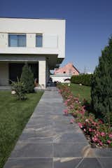Outdoor, Front Yard, and Grass  Photo 3 of 14 in Voluntari Residence by Razvan Barsan + Partners