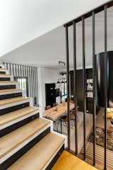 Staircase, Wood Tread, and Metal Railing  Photo 19 of 23 in Flight House by Razvan Barsan + Partners