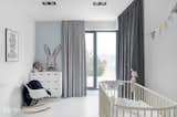 Kids, Playroom, Bedroom, Bed, Dresser, Rockers, Lamps, Chair, Toddler, Neutral, and Boy  Kids Dresser Boy Lamps Bed Photos from Minimal Seaside Villa