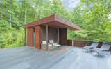 Rooftop, Metal Patio, Porch, Deck, Stone Patio, Porch, Deck, Metal Fences, Wall, Exterior, Metal Roof Material, and Metal Siding Material 'Tree House' - Terrace  Photo 5 of 9 in Mtn. House Research by Mark Stewart