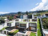 Outdoor, Garden, Front Yard, Rooftop, Side Yard, Grass, Gardens, and Metal Fences, Wall  Photo 14 of 16 in FF Houses by TEC Taller EC
