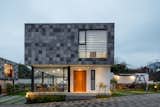 Exterior, Stone Siding Material, and House Building Type  Photo 3 of 12 in QUATRO houses by TEC Taller EC