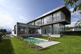 Outdoor, Infinity Pools, Tubs, Shower, Concrete Patio, Porch, Deck, Back Yard, Gardens, Swimming Pools, Tubs, Shower, Small Patio, Porch, Deck, and Grass  Photo 3 of 15 in INTERLACE HOUSE by TEC Taller EC