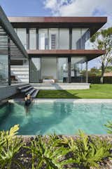 Outdoor, Back Yard, Infinity Pools, Tubs, Shower, Grass, and Swimming Pools, Tubs, Shower  Photo 4 of 15 in INTERLACE HOUSE by TEC Taller EC