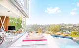 Interior (heated) concrete floor smoothly links to exterior concrete pool deck
