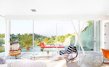When closed, the large glass panels span from floor to ceiling