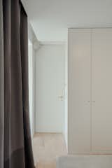 Bedroom, Wardrobe, and Cork Floor  Photo 17 of 23 in Rua Maria Loft by KEMA studio