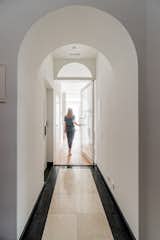 Hallway, Medium Hardwood Floor, and Limestone Floor  Photo 14 of 34 in VILA FERREIRA by KEMA studio