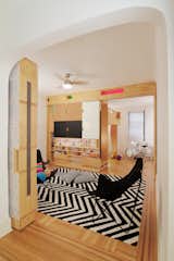Playroom open to bedroom with storage units