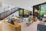 Step inside to discover the newly refinished interior that showcases an array of elements like glass, wood, and steel across an open, sunlit floorplan. The expansive, floor-to-ceiling windows will leave you in awe as you gaze out at the private botanical gardens enveloping the space.

The solar/radiant heated floors will lead you through to a fabulous dining area where you can host groups big and small.