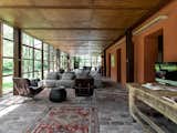Living Room, Ottomans, Sofa, Coffee Tables, and Floor Lighting  Photo 13 of 16 in Country House by zanon architetti associati