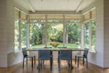 Dining Room, Table, Medium Hardwood Floor, and Pendant Lighting  Photo 2 of 11 in Twin Oaks Residence by Altura Architects