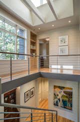 Hallway and Medium Hardwood Floor  Photo 7 of 11 in Twin Oaks Residence by Altura Architects